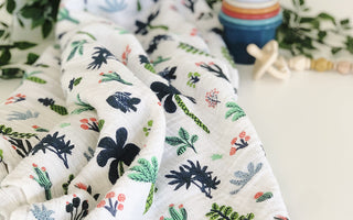Pick a Nursery Theme Using Your Favorite Swaddle Like This...