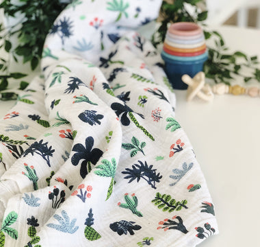 Pick a Nursery Theme Using Your Favorite Swaddle Like This...