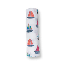 Load image into Gallery viewer, Lulujo Inc.s Cotton Swaddle featuring a colorful sailboats print.