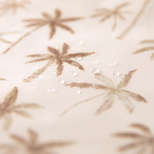 Load image into Gallery viewer, Close-up of water droplets on Bumkins Wet/Dry Bag: Palm Daze.