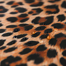 Load image into Gallery viewer, Close-up of water droplets on Roamio by Bumkins Wet Bag: Leopard.