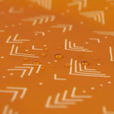 Close-up of water droplets on Bumkins Short-Sleeved Smock: Grounded.