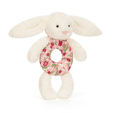 Jellycat Blossom Cream Bunny 'Berry' Ring Rattle: a soft plush with floppy ears and pink floral body, perfect for babies.