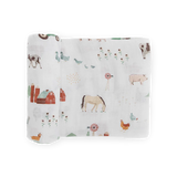 Little Unicorn Cotton Swaddle, Farmyard—soft, breathable muslin blanket with cute farm prints in gentle pastels for cozy cuddles.