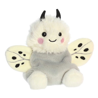 Palm Pals, Astra Moth by Aurora is a plush with fluffy white fur, black antennae, spotted wings, and a smiling face.