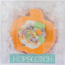 Load image into Gallery viewer, Hopscotchs Sidewalk Chalk, Pumpkin is pumpkin-shaped and bright-colored, with glitter on top in clear wrap.