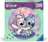 500 Piece Puzzle, Stitch: teal box with photo of pastel puzzle with 2 cartoon characters. Text "Disney Stitch 500 Ravensburger Puzzle."