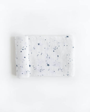 Little Unicorn Cotton Swaddle, Shooting Stars: soft, breathable muslin with blue stars on white—perfect comfort for babies.