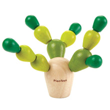 Load image into Gallery viewer, The PlanToys Balancing Cactus Mini is a strategic, eco-friendly game with green pieces on a wooden base.