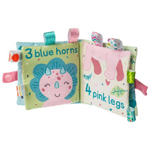 Load image into Gallery viewer, Mary Meyers Aroarasaurus Soft Book: Triceratops-themed with 3 blue horns & Taggies ribbons—ideal for bedtime tales and tactile play.