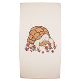 Organic Crib Sheets, Tiny Tortoise: 100% organic beige cotton sheets with a tortoise and flower illustration.