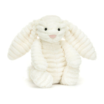 Jellycat Bashful Bunny Luxe Nimbus, a plush lop-eared bunny, sits upright with stitched nose and button eyes against a plain background.