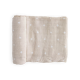 Little Unicorn Cotton Swaddle, Taupe Cross: breathable taupe muslin blanket with white crosses, neatly folded on a white background.