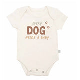 Organic Bodysuit, Every Dog Needs a Baby: white short sleeve bodysuit with text "Every Dog Needs A Baby." Made of 100% organic cotton.