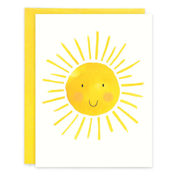 A Smiling Sun greeting card featuring a hand-painted yellow sun with a smiling face, displayed with a matching A2 size colored envelope.