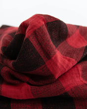 Load image into Gallery viewer, Close-up of a crumpled Cotton Swaddle, Red Plaid by Little Unicorn on a plain background.
