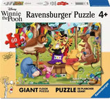 60 Piece Floor Puzzle, Pooh Magic Show: yellow & white box with cartoon illustrations; text "Disney Winnie the Pooh Ravensburger Puzzle 4+.”