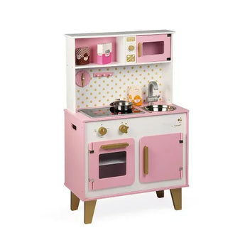 Janod Juratoys Candy Chic Big Cooker: a pink and white wooden play kitchen with a stove, sink, oven, microwave, and play food accessories.
