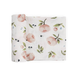 Little Unicorn Organic Cotton Swaddle, Watercolor Floret—sweet shower gift in pink peach & green leaf muslin print.