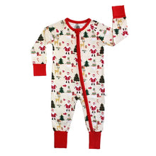 Load image into Gallery viewer, Sleeper, Cozy Christmas: cream long sleeve pajamas with Santa, reindeer, & tree pattern, red cuffs, & front zipper; made of bamboo viscose.
