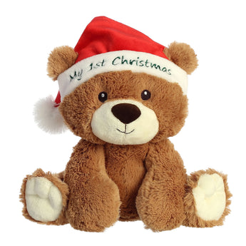 Aurora My First Christmas Bear—plush bear in a red Santa hat, perfect for baby’s first holiday and lasting memories.