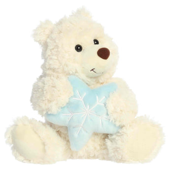 Aurora Bear w/ Snowflake: this cuddly white teddy hugs a snowflake pillow—a perfect winter cuddle buddy.