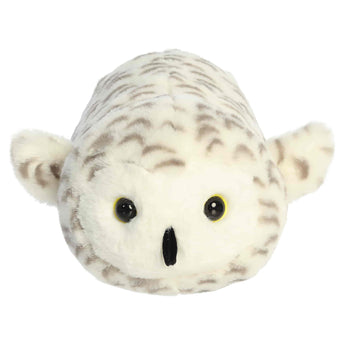 Aurora Octavia Snowy Owl: This plush has white and brown spotted fur, round black eyes, and small outspread wings.