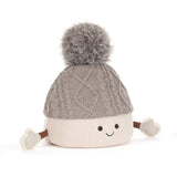 Jellycat’s Amuseables Pomilly sports a gray knit hat, fluffy pompom, and cozy mittens—perfect for Jellycat plush lovers!.