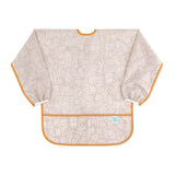 Bumkins Long-Sleeved Art Smock: Wander—beige waterproof fabric with white abstract design, orange trim, front pocket, and adjustable tie closure.