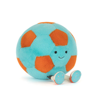 Jellycat Amuseables Soccer plush—blue & orange ball with a smiling face and blue shoes—sits on a white background.