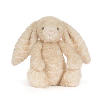A soft, tan Jellycat Franilla Luxe Bunny Original plush with long floppy ears and a pink nose.