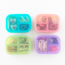 Load image into Gallery viewer, Four colorful bento boxes, including Bumkins Silicone Bento Box 3 Section: Pink Jelly, are meal-prep ready on a white background.