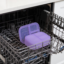 Load image into Gallery viewer, Bumkins Silicone Bento Box 3 Section: Purple Jelly sits in the top rack of an open dishwasher.
