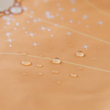 Load image into Gallery viewer, Close-up of water droplets on Bumkins Ruffle Apron Bib: Belle.
