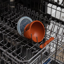 Load image into Gallery viewer, Bumkins Silicone First Feeding Set: Clay sits in the top rack of an open dishwasher.