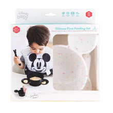 Load image into Gallery viewer, Bumkins Silicone First Feeding Set: Mickey Mouse Vanilla Sprinkle is shown in a packaging box, with a clear window partially showing the bowl.