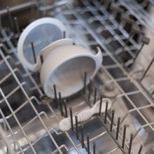 Load image into Gallery viewer, Bumkins Silicone First Feeding Set: Gray sits in the top rack of an open dishwasher.