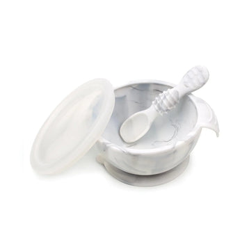 Bumkins Silicone First Feeding Set: Marble includes a bowl with suction bottom, a matching spoon, and a transparent lid.