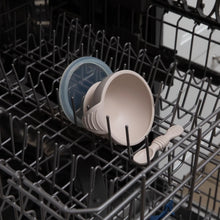 Load image into Gallery viewer, Bumkins Silicone First Feeding Set: Sand sits in the top rack of an open dishwasher.