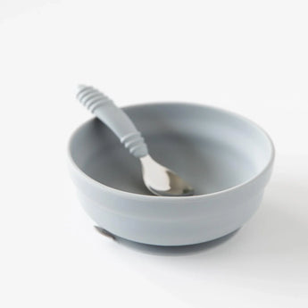 Bumkins Silicone Grip Bowl: Gray sits with a matching spoon inside on a white background.