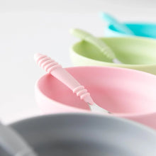 Load image into Gallery viewer, Close-up of four bowls and spoons, including Bumkins Silicone Grip Bowl: Pink, on a white background.