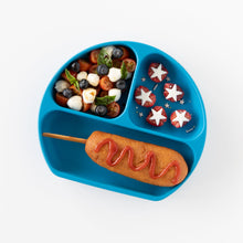 Load image into Gallery viewer, Bumkins Silicone Grip Dish: Dark Blue holds a corn dog, berries, and tomato & cheese salad on a white background.