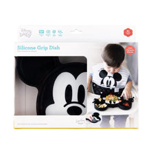 Load image into Gallery viewer, Bumkins Silicone Grip Dish: Mickey Mouse in a white packaging box with a photo of a child and a clear window partially displaying the dish.