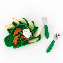 Load image into Gallery viewer, Bumkins Silicone Grip Dish, Special Edition: Dino holds dino nuggets, apple slices, and snacks on a white background next to green utensils.