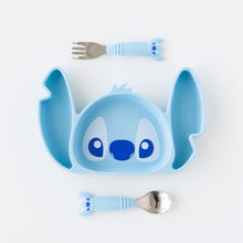 Load image into Gallery viewer, Bumkins Spoon + Fork: Stitch sits by a Stitch-shaped silicone plate on a white background.