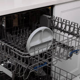 Bumkins Silicone Grip Dish: Gray sits in the top rack of an open dishwasher.