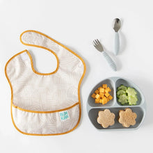 Load image into Gallery viewer, Bumkins Silicone Grip Dish: Gray cheese cubes, cucumber slices, and sandwiches near gray utensils and a beige bib on a white background.