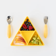 Load image into Gallery viewer, Bumkins Silicone Grip Dish: Zelda™ Triforce holds berries, peaches, and avocado next to yellow handle utensils on a white background.