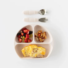 Load image into Gallery viewer, Bumkins Silicone Grip Dish: Sand holds fruit, sautéed potatoes, and omelette, with a matching fork and spoon above on a white background.