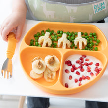 Load image into Gallery viewer, Close-up of a child eating yogurt, fruit, & veggies from an orange divided plate with Bumkins Spoon + Fork: Tangerine.